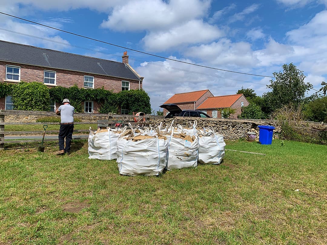 New stone wall in the orchard